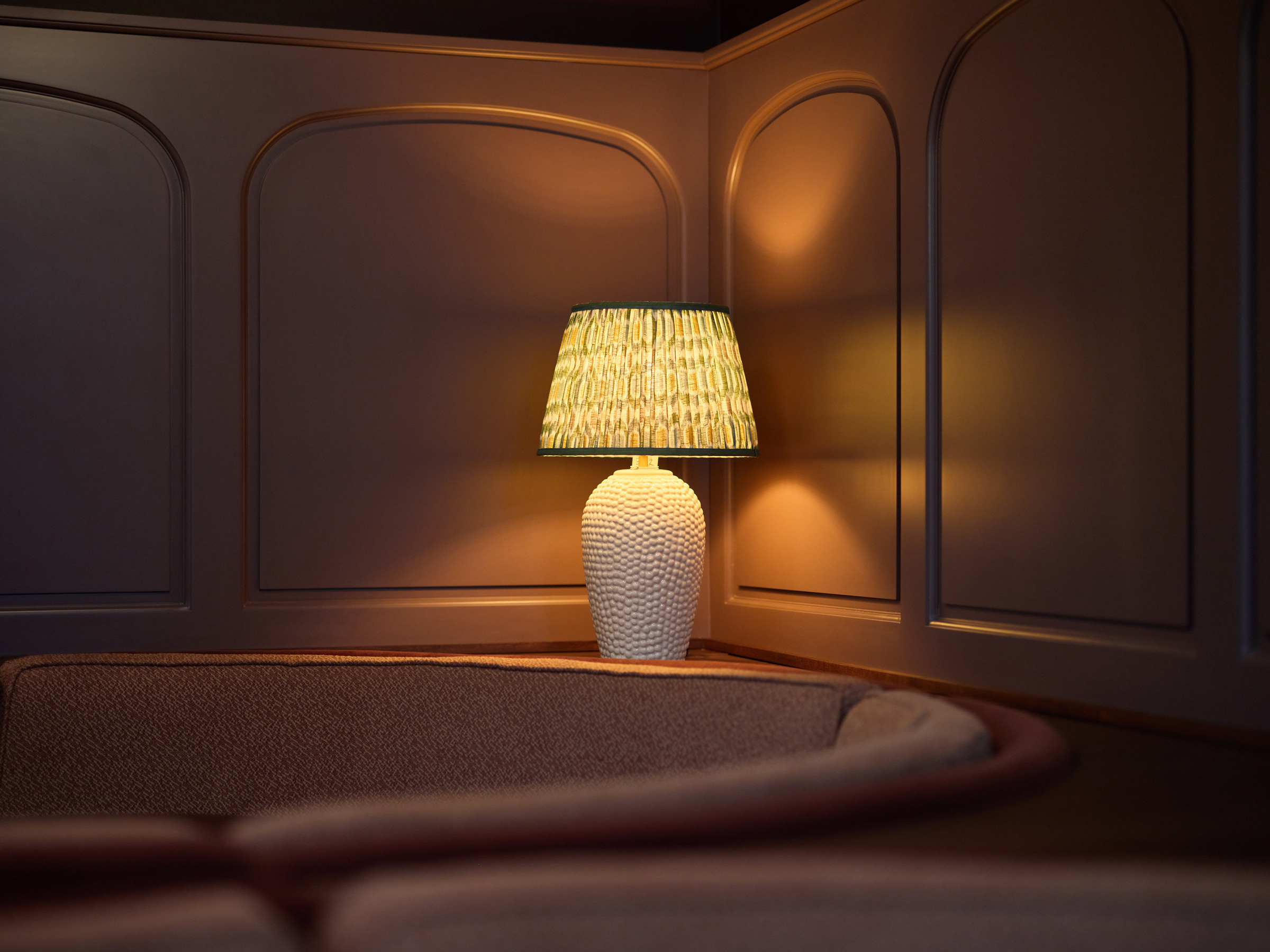 A lamp-lit corner inside One Eastside